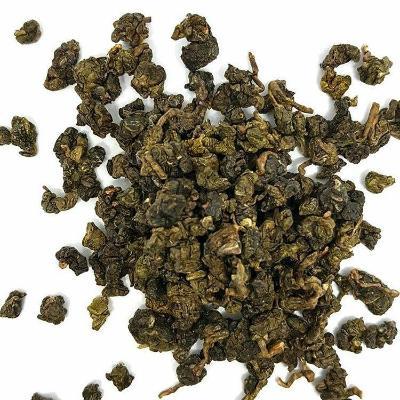 Tung Ting Oolong loose leaf tea on white background